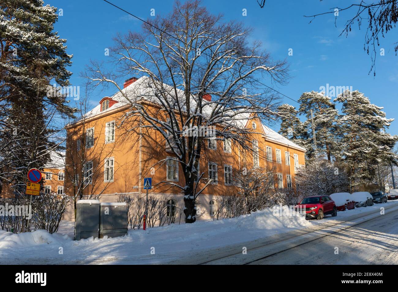 Residential building on Laajalahdentie in Munkkiniemi district on a sunny winter day. Helsinki, Finland. Stock Photo