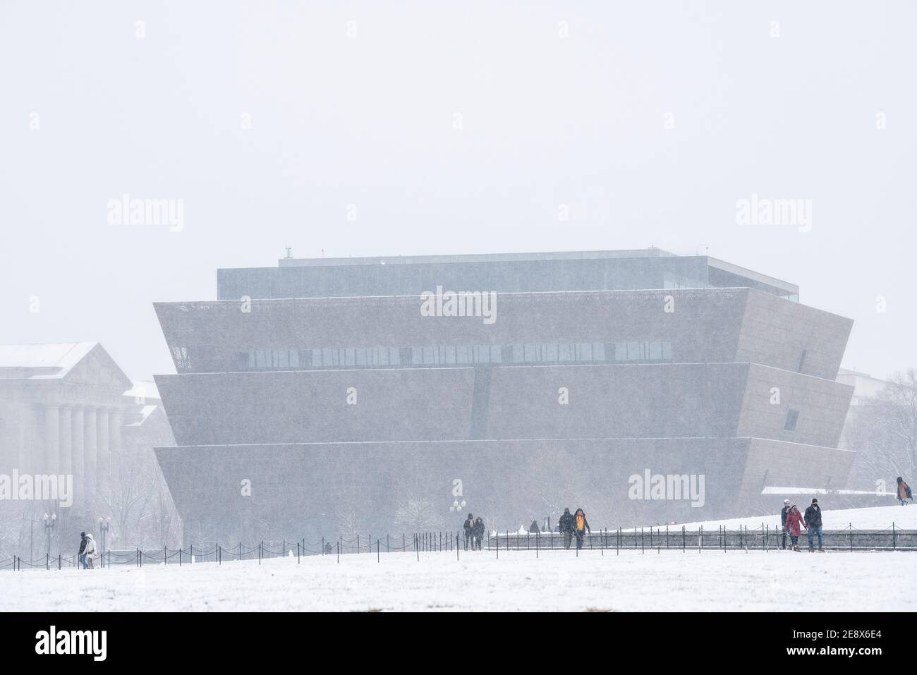 Exterior view of the Smithsonian National Museum of African American History and Culture (NMAAHC) during a snow fall in Washington, D.C. Stock Photo