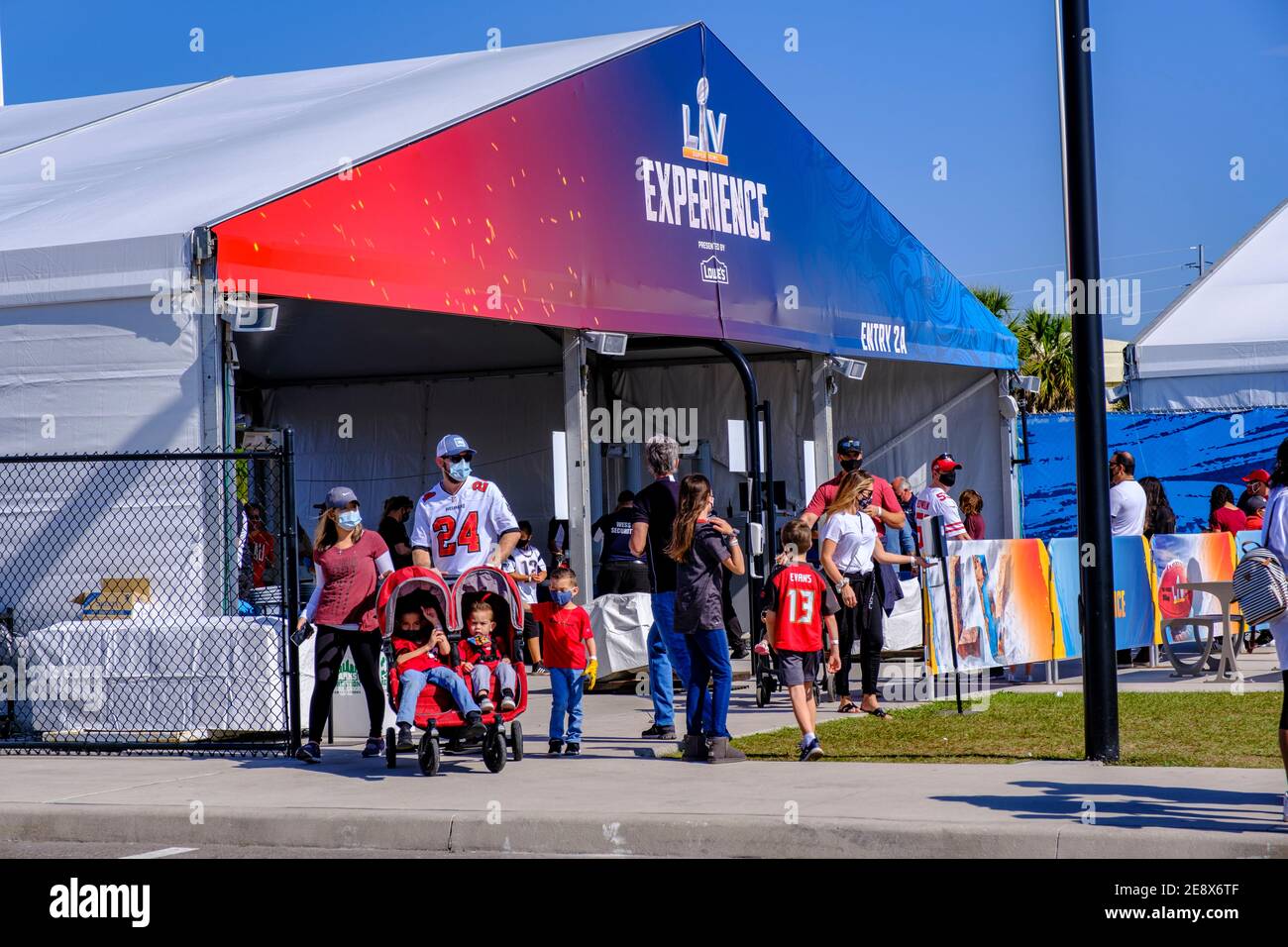 People exiting security checkpoint at the NFL Experience - Super Bowl LV (55) Tampa, Florida- Super Bowl LV (55) Tampa, Florida Stock Photo