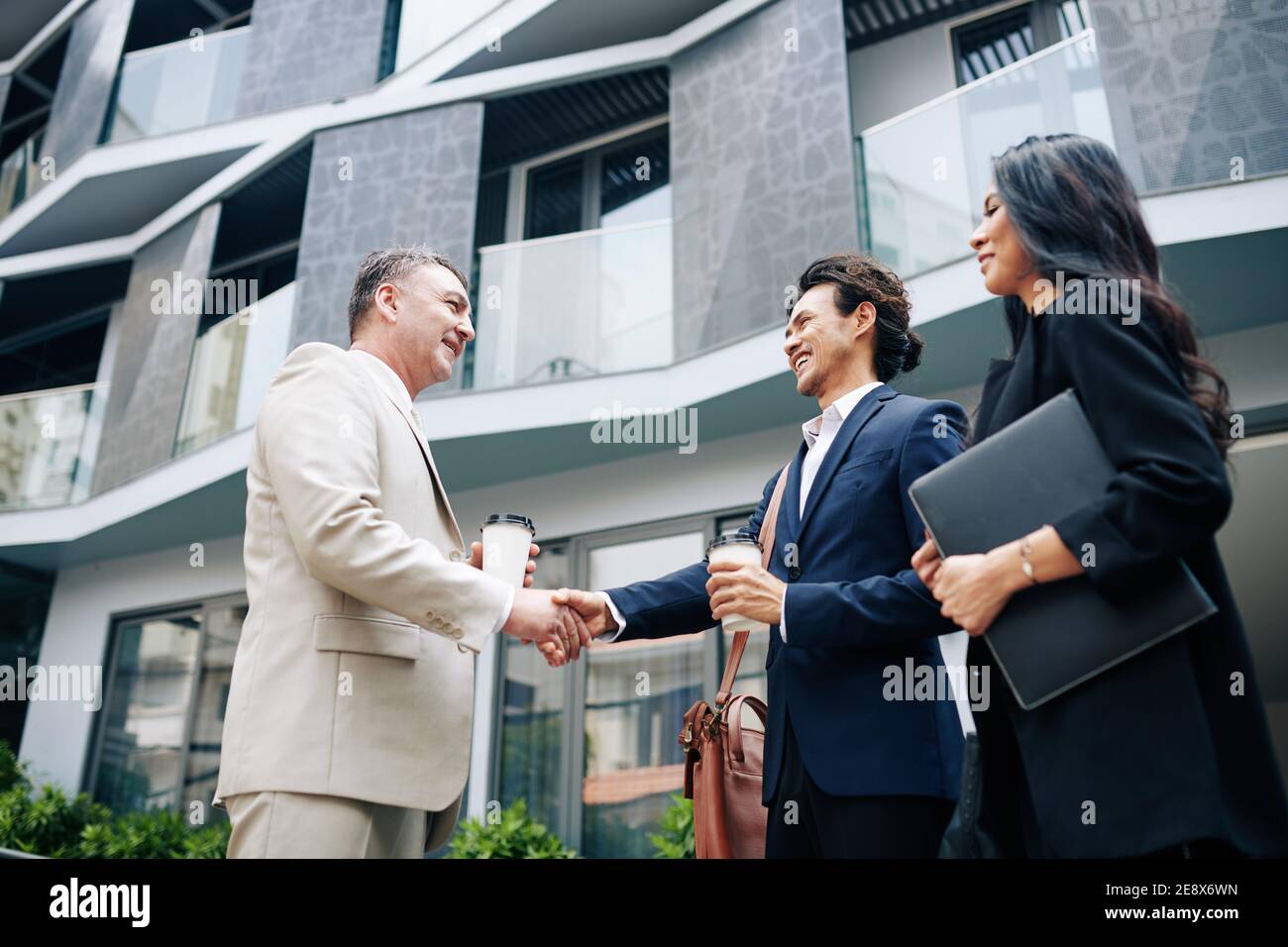 Business partners shaking hands Stock Photo