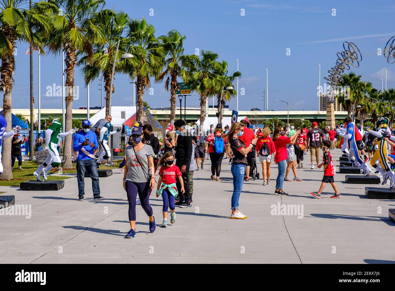 Woman photographing son at the NFL Experience - Super Bowl LV (55) Tampa, Florida Stock Photo
