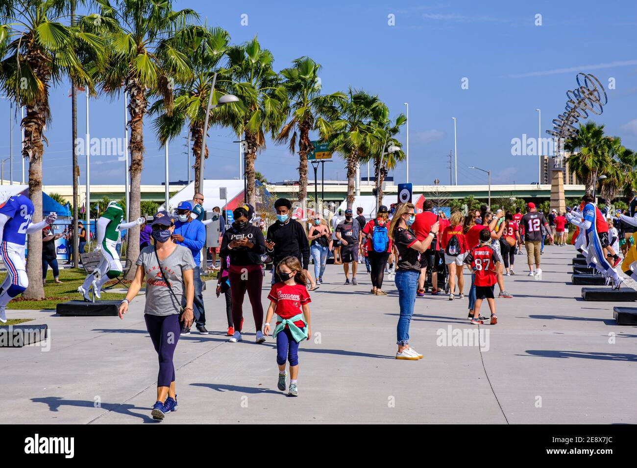 Woman photographing son at the NFL Experience - Super Bowl LV (55) Tampa, Florida Stock Photo