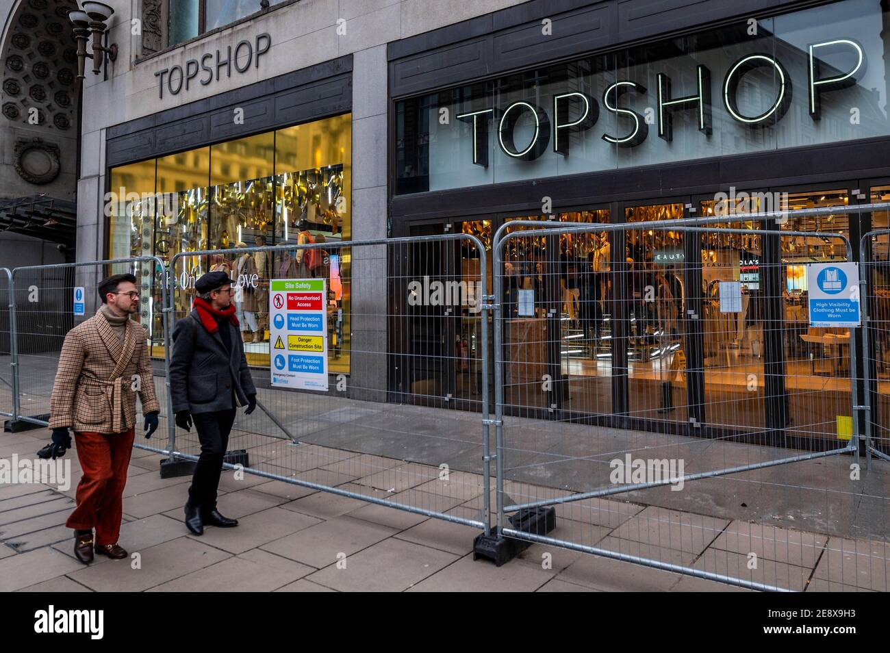 London, UK. 1st Feb, 2021. The Top Shop brand seems to have been sold to  Asos, meaning the closure of its stores, including the Flagship Oxford  Street one (now fenced off here),