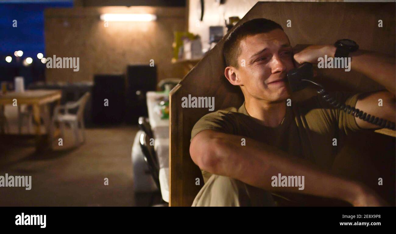 USA. Tom Holland in ©Amazon Studios film: Cherry (2021). Plot: An Army  medic suffering from post-traumatic stress disorder becomes a serial bank  robber after an addiction to drugs puts him in debt.