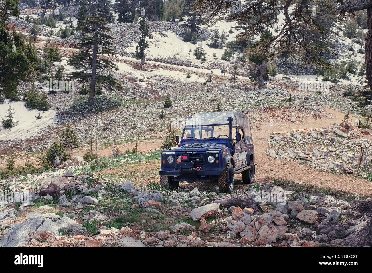 Halt of off-road extreme expedition on top of Taurus snow mountains. Excursion trip in the all-wheel drive vehicles on snow mountain roads.Leisure suv Stock Photo