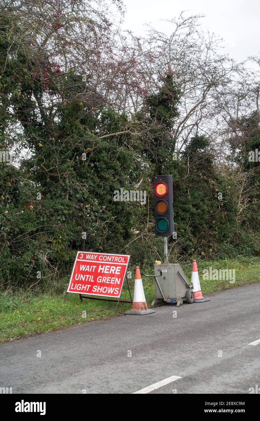 Temporary road works traffic lights Stock Photo