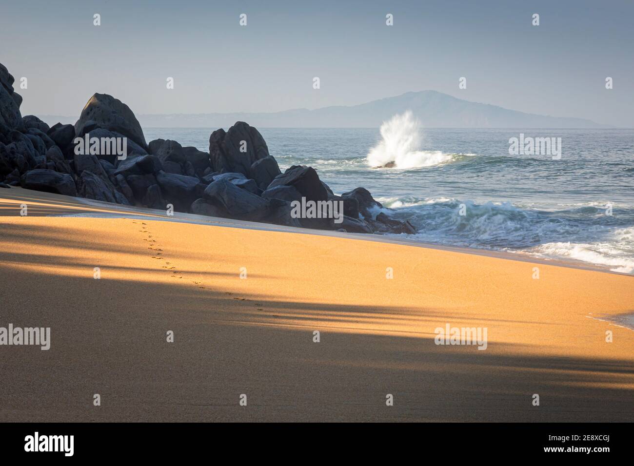 Waves crashing on the Playa Escondida beach near Sayulita, Narayit, Mexico. Stock Photo