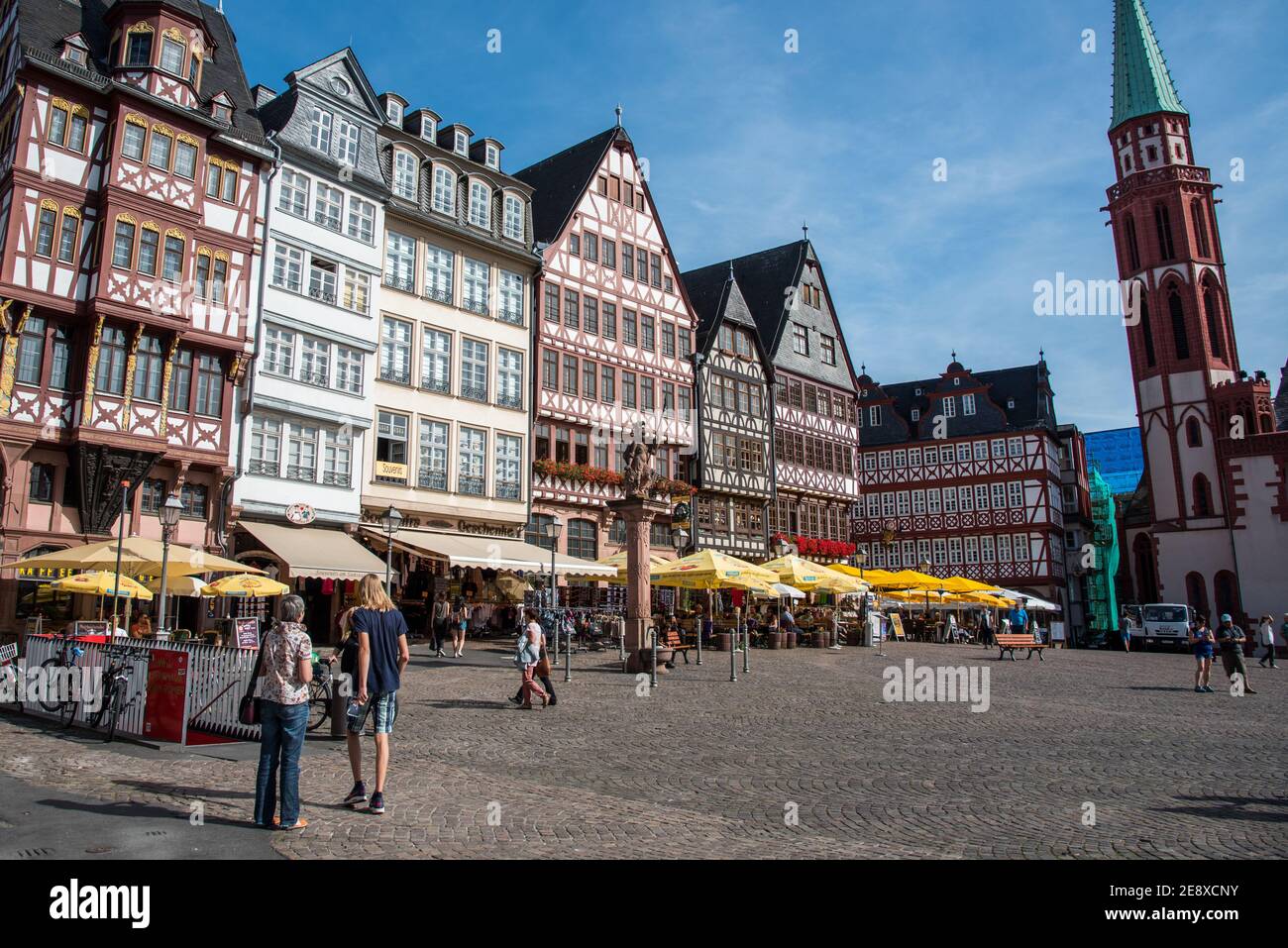 Historical landmark of Romerberg square with people around at the city ...
