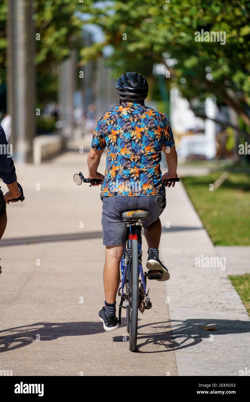 Man riding bike hotsell
