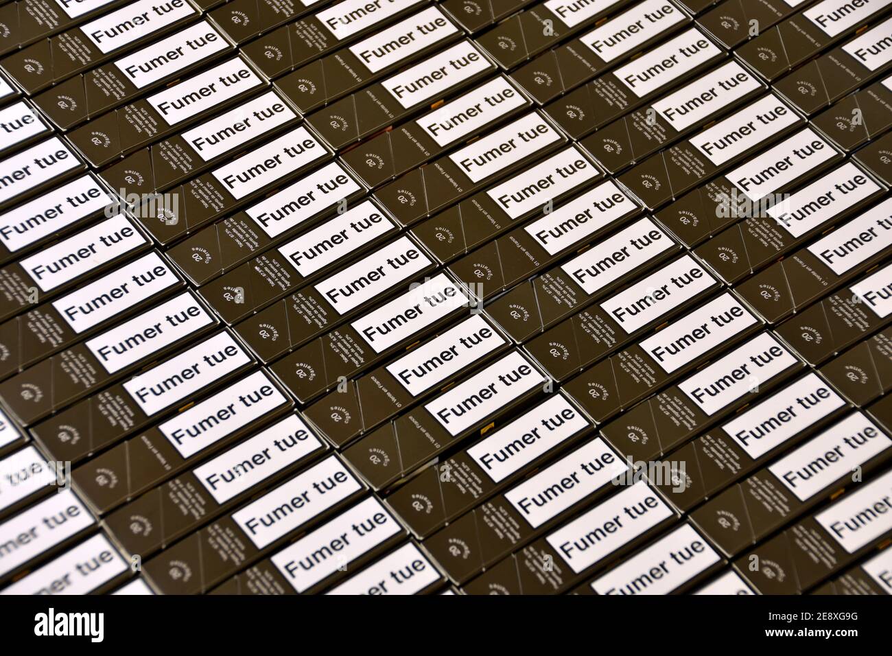 France. 31st Jan, 2021. In this photo illustration cigarette packets lined up diagonally.Some