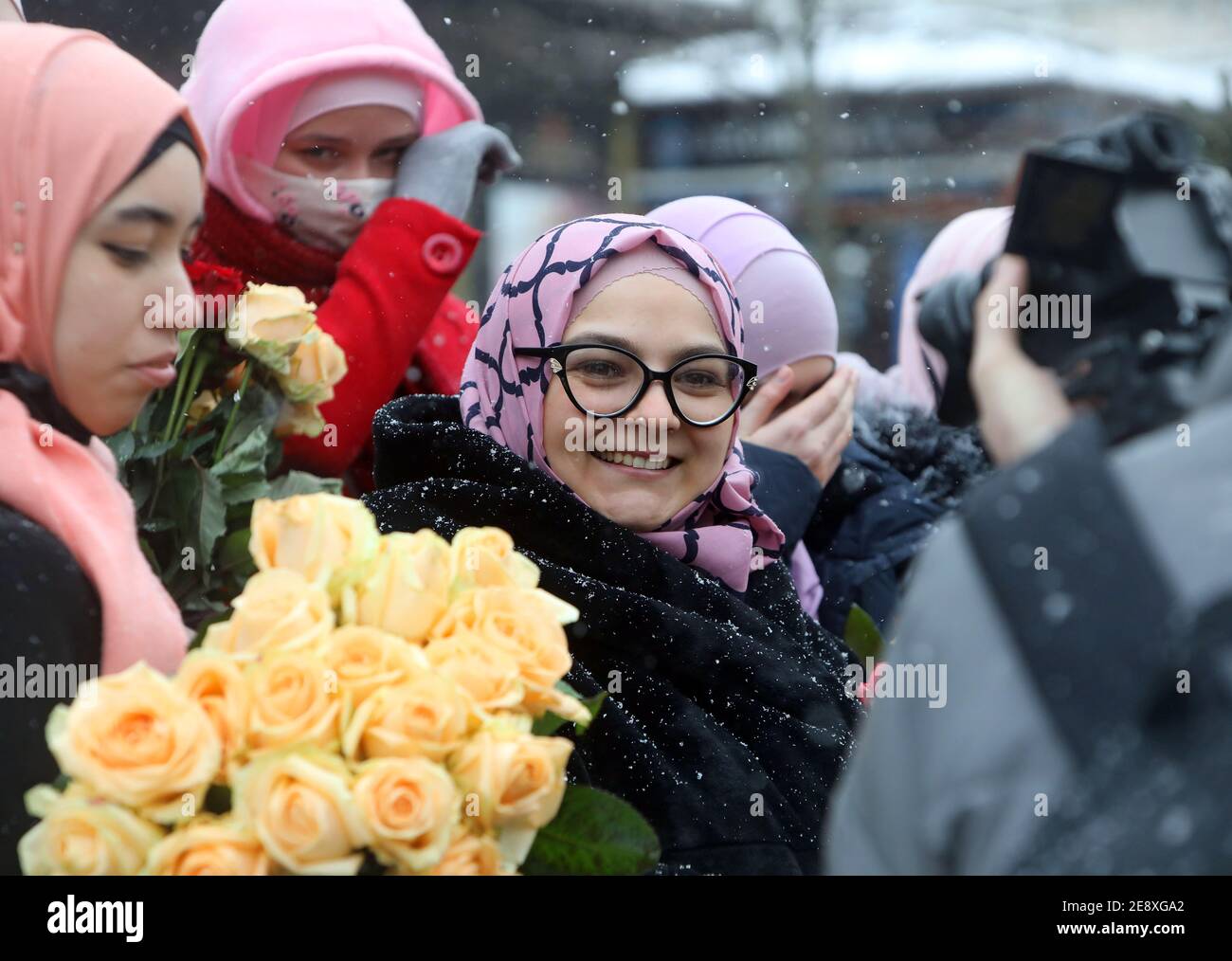 Non Exclusive: KYIV, UKRAINE - FEBRUARY 1, 2021 - A woman smiles during an action on Khreshchatyk Street on World Hijab Day, Kyiv, capital of Ukraine. Stock Photo