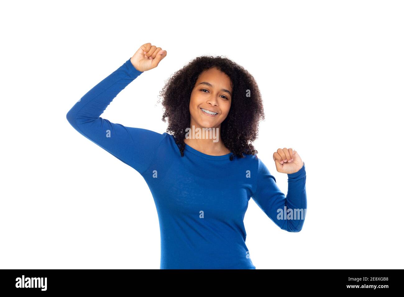 Teenager girl with afro hair wearing blue sweater isolated on a white ...