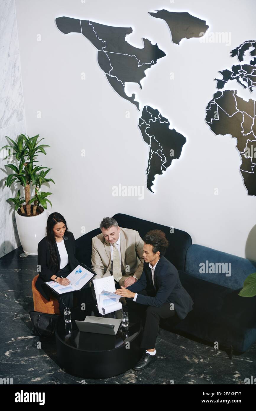 Entrepreneurs working with documents Stock Photo