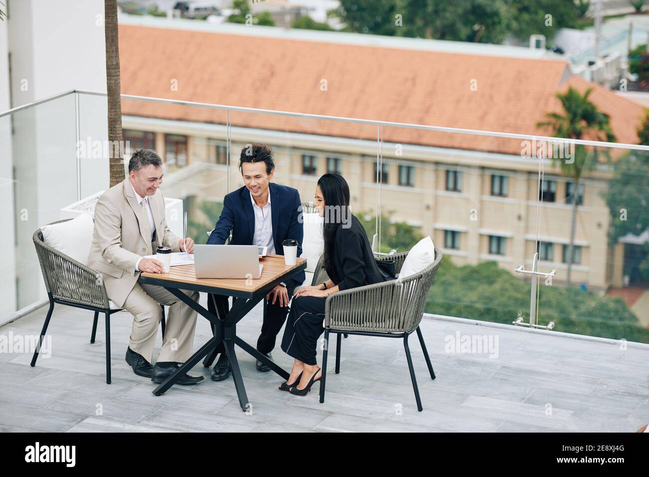 Business people discussing documents Stock Photo