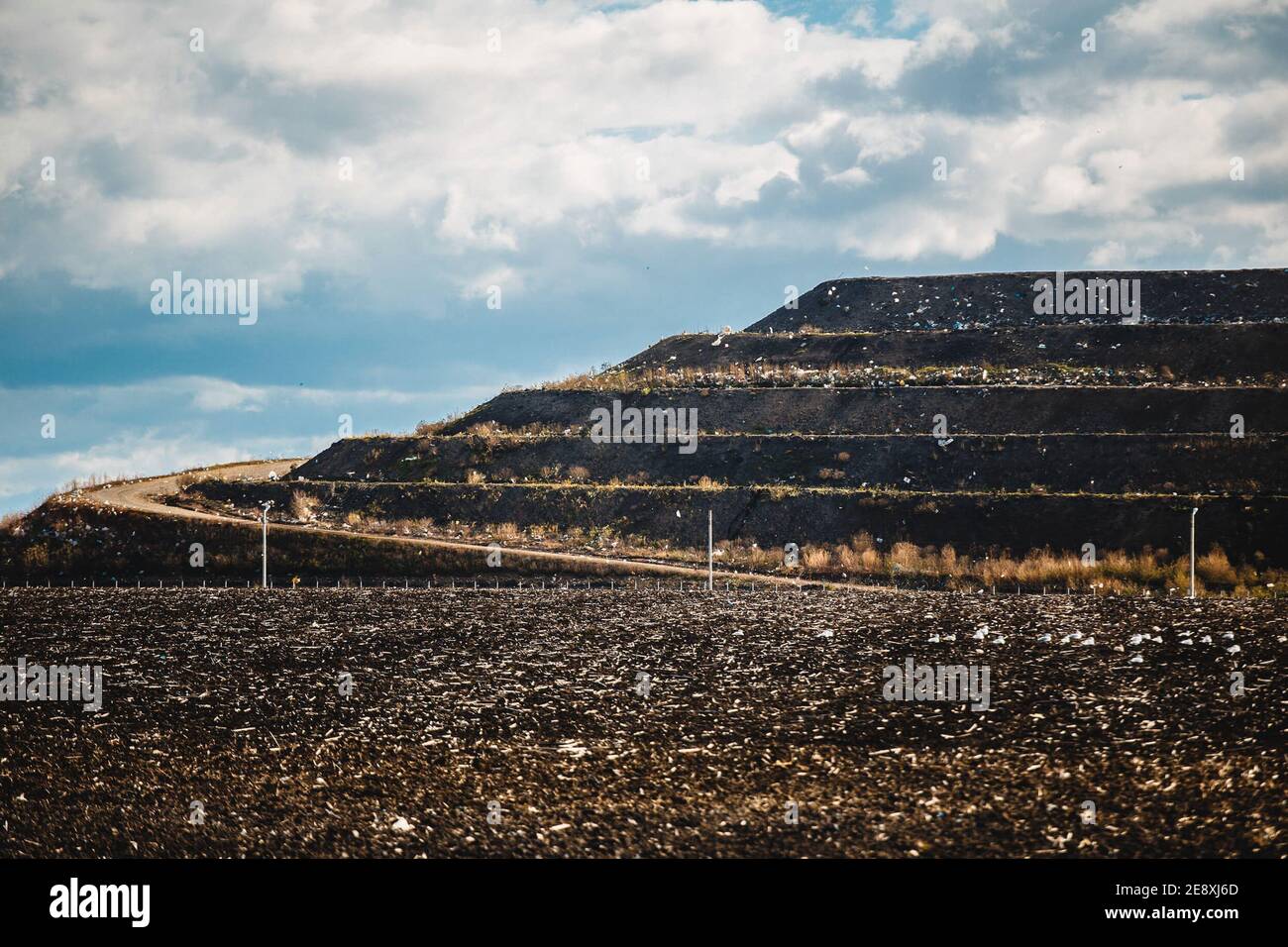 Terraces at the landfill. Arrival at the landfill of household waste