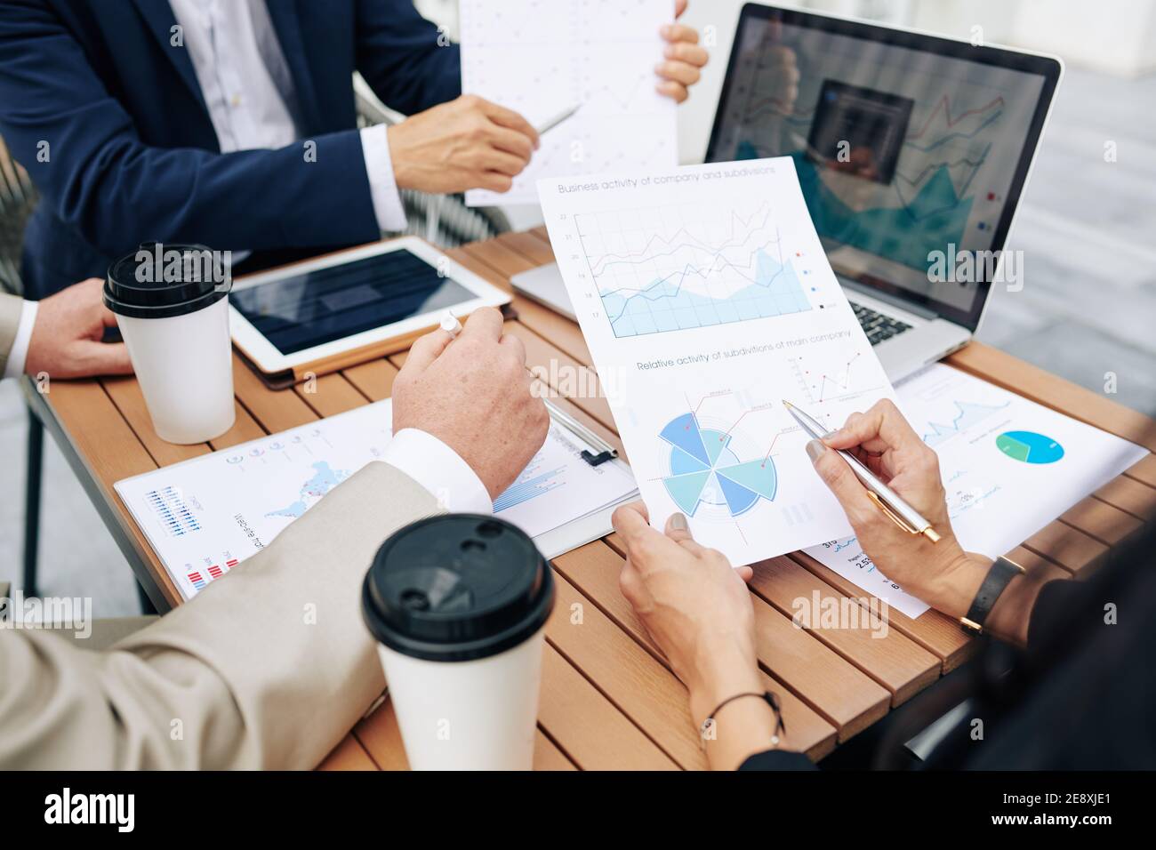 Colleagues discussing business activity Stock Photo