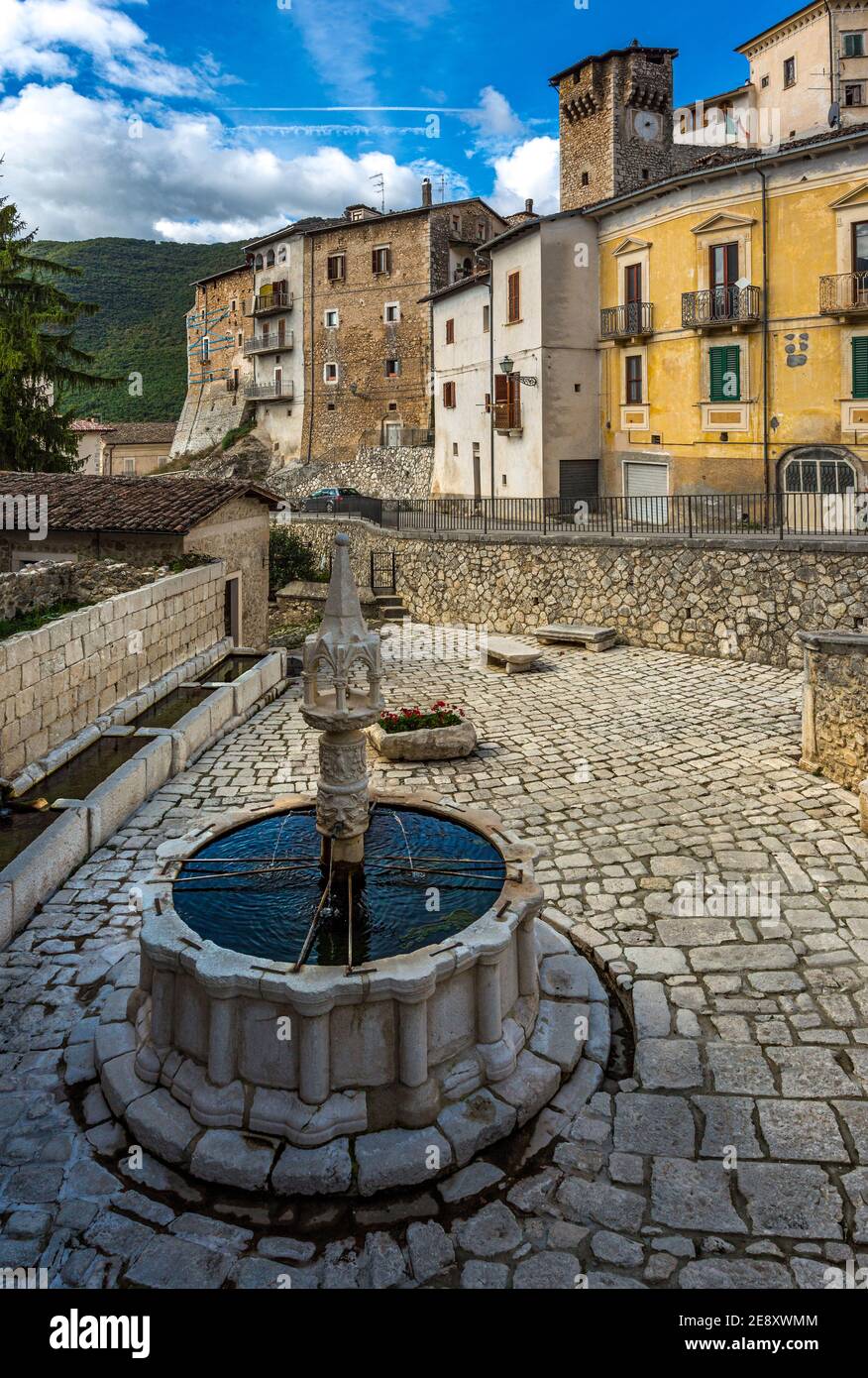 The medieval square of Fontecchio with its fountain and paved floor. Province of L'Aquila, Abruzzo, Italy, Europe Stock Photo