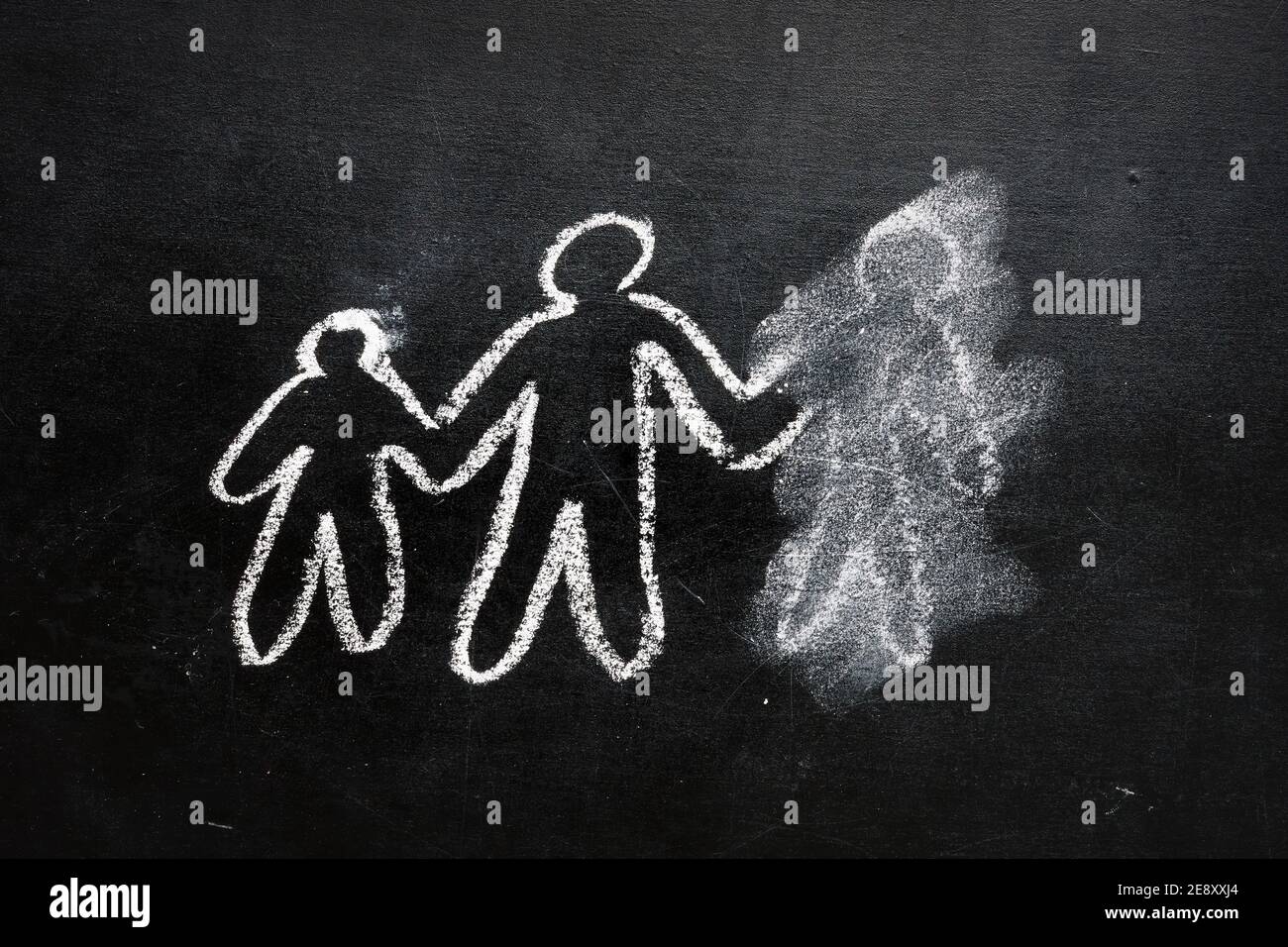 Divorce concept. Figures of family with one erased. Stock Photo