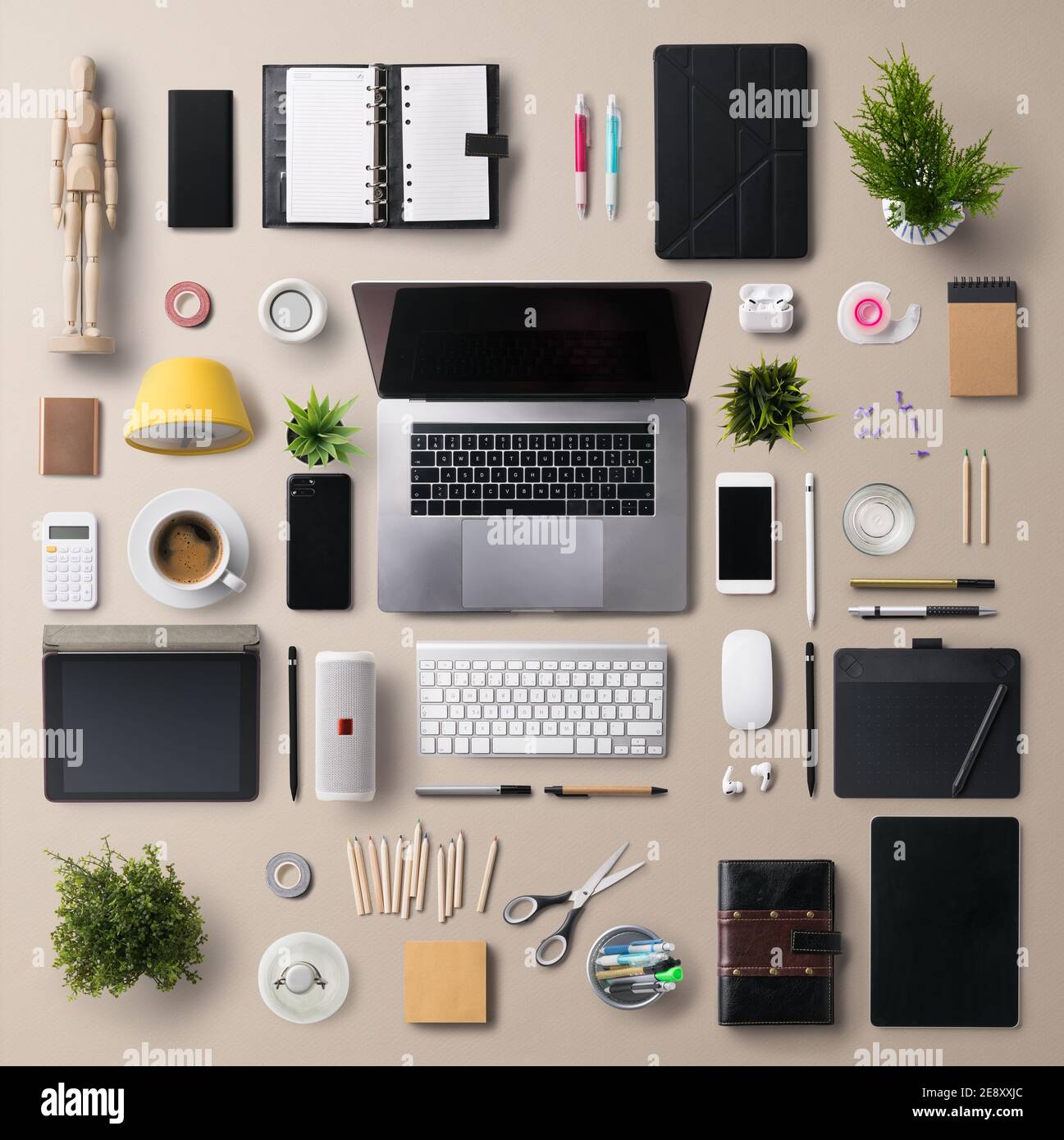 Flat lay top view office desk working space with laptop and office supplies  on gray background Stock Photo - Alamy
