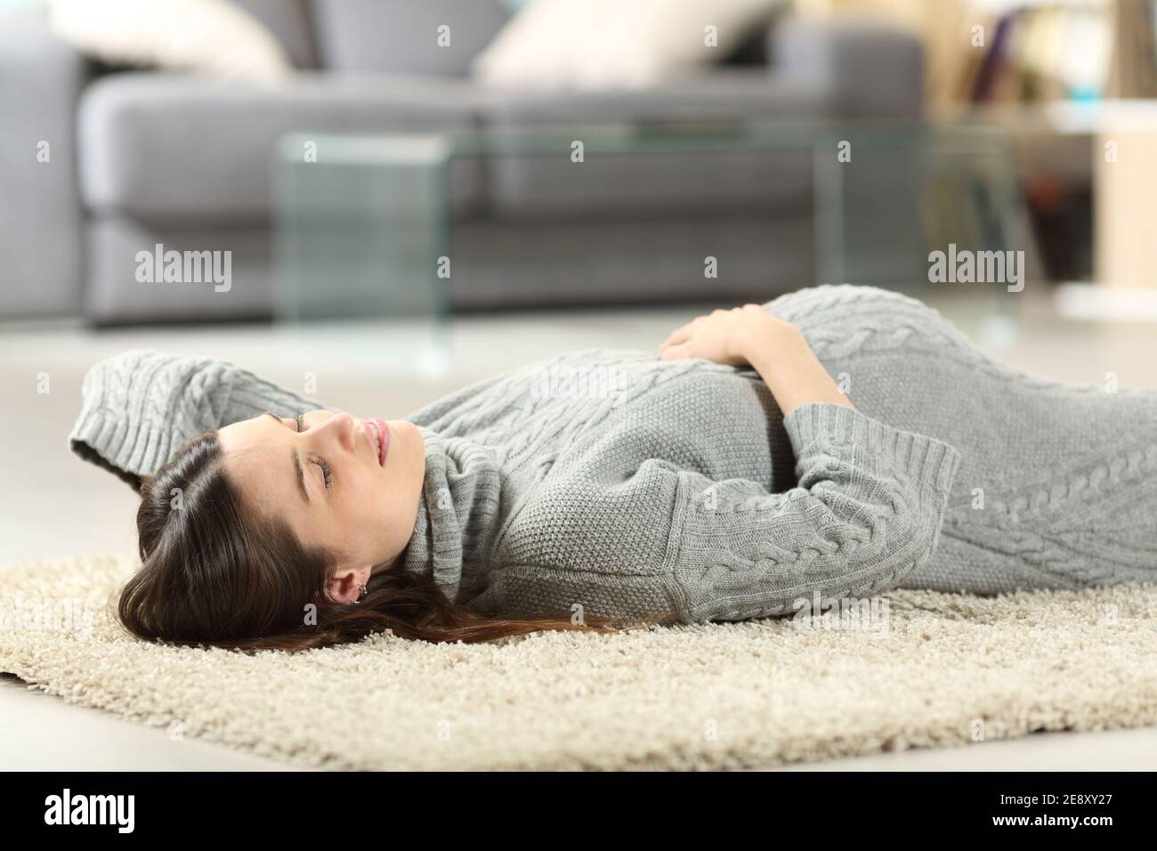 Beautiful pregnant woman sleeping in hires stock photography and