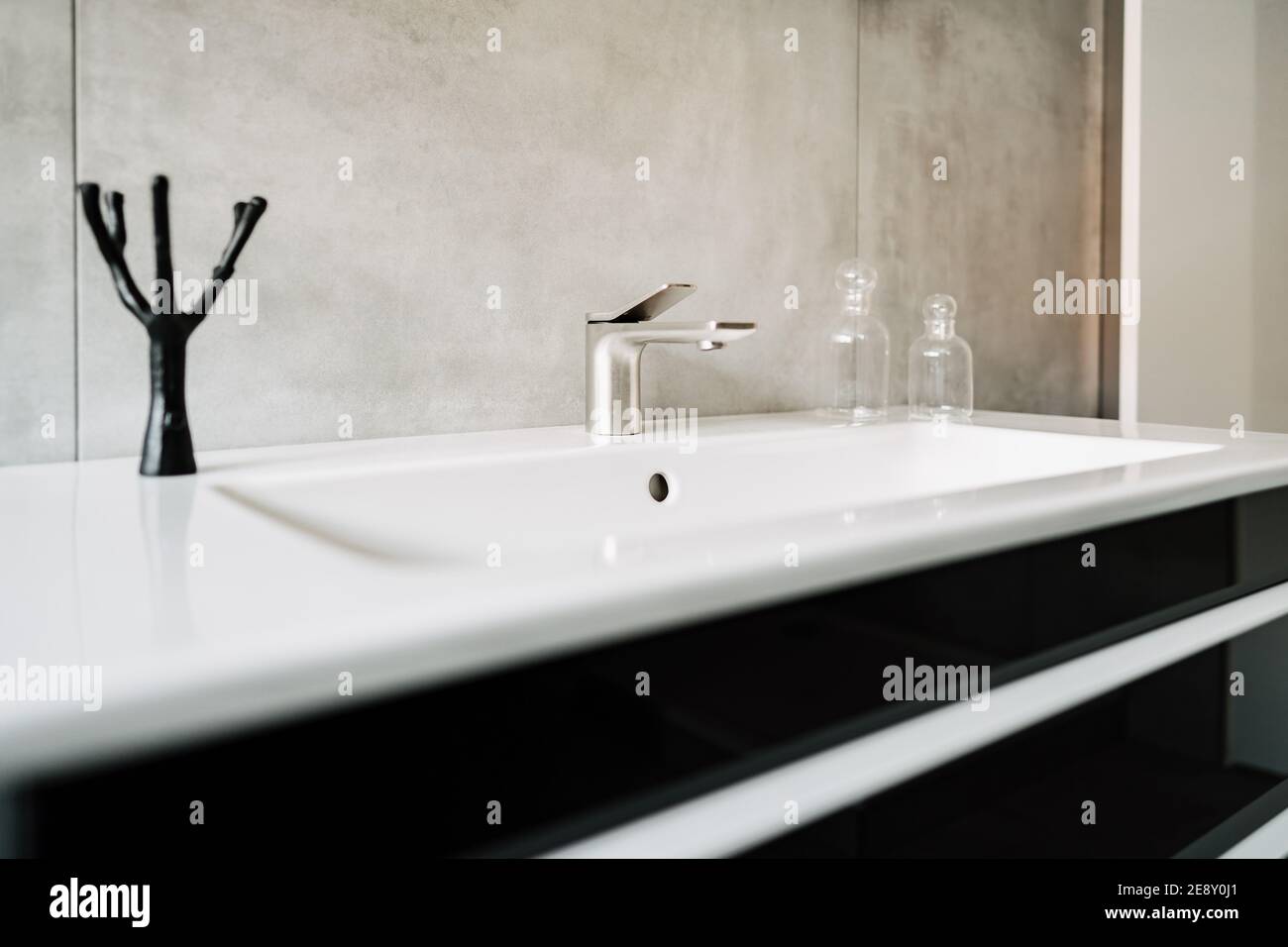 photo of a black and white modern bathroom sink Stock Photo - Alamy