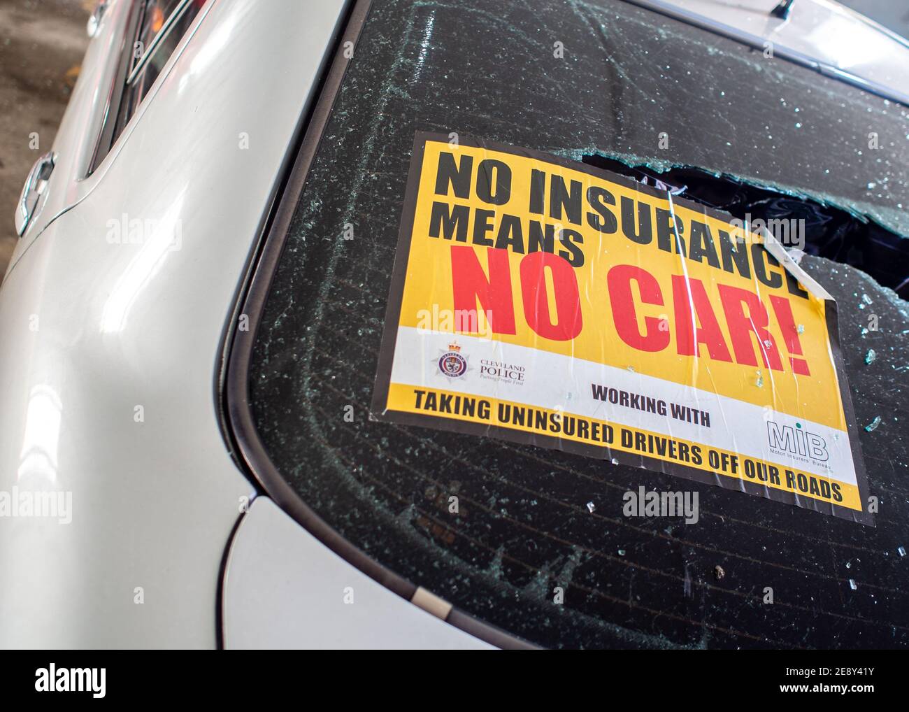 No insurance means no car sticker issued by police stuck on smashed