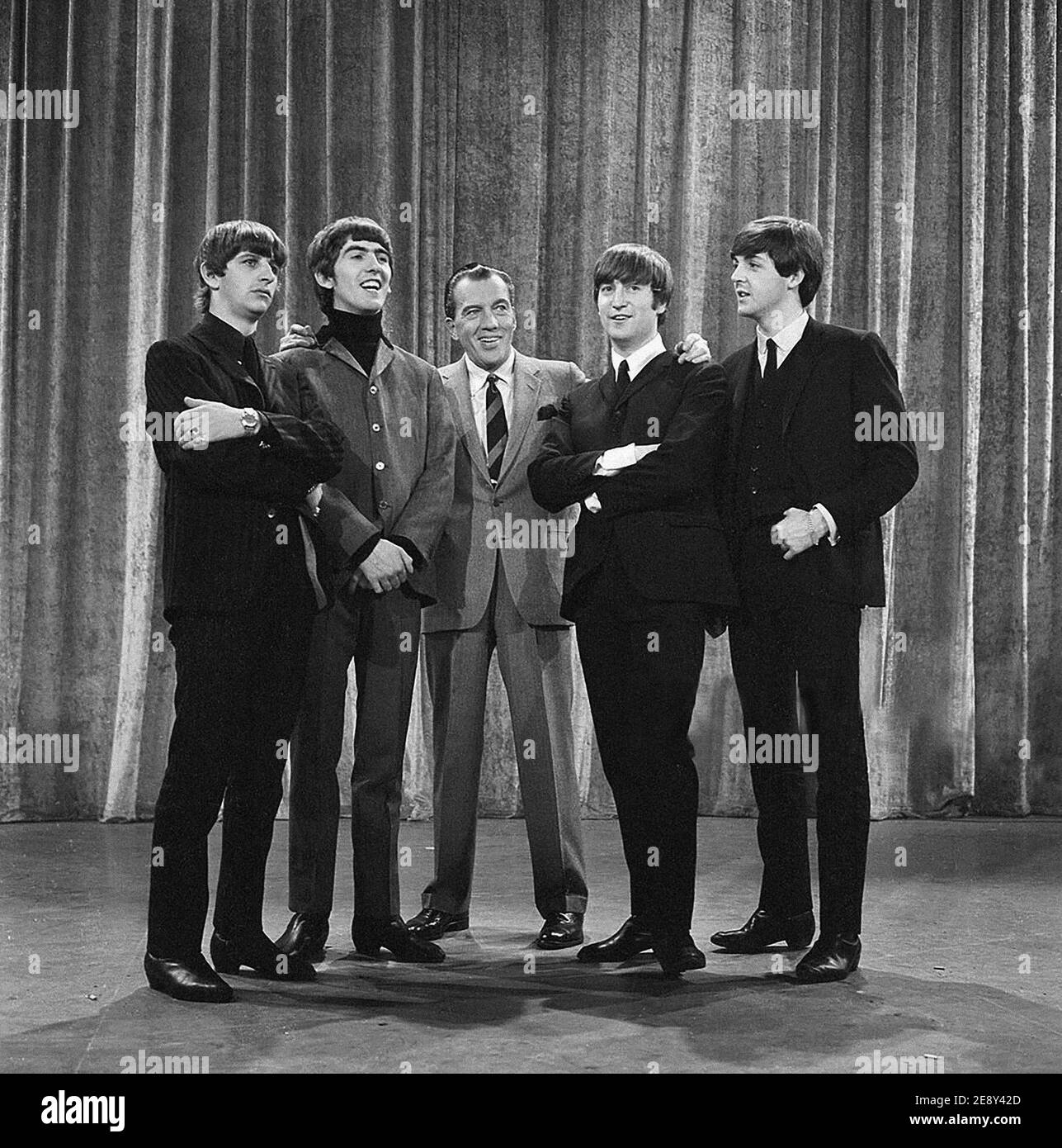 The Beatles with Ed Sullivan in 1964 Stock Photo