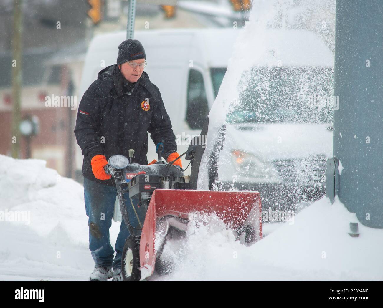 Jamison, United States. 01st Feb, 2021. Chris Wiley uses a snowblower