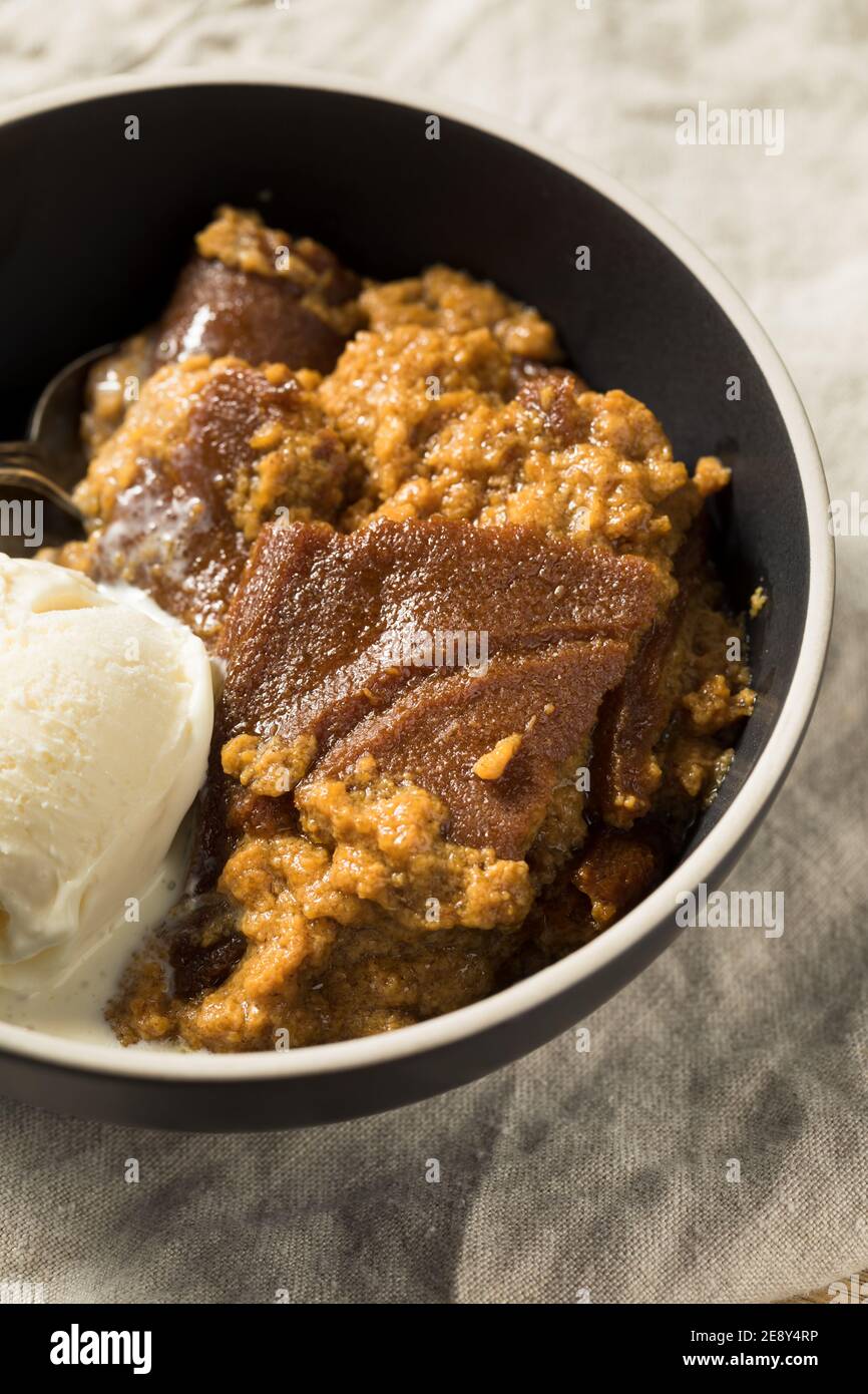 Homemade Cornmeal Indian Bread Pudding with Ice Cream Stock Photo Alamy