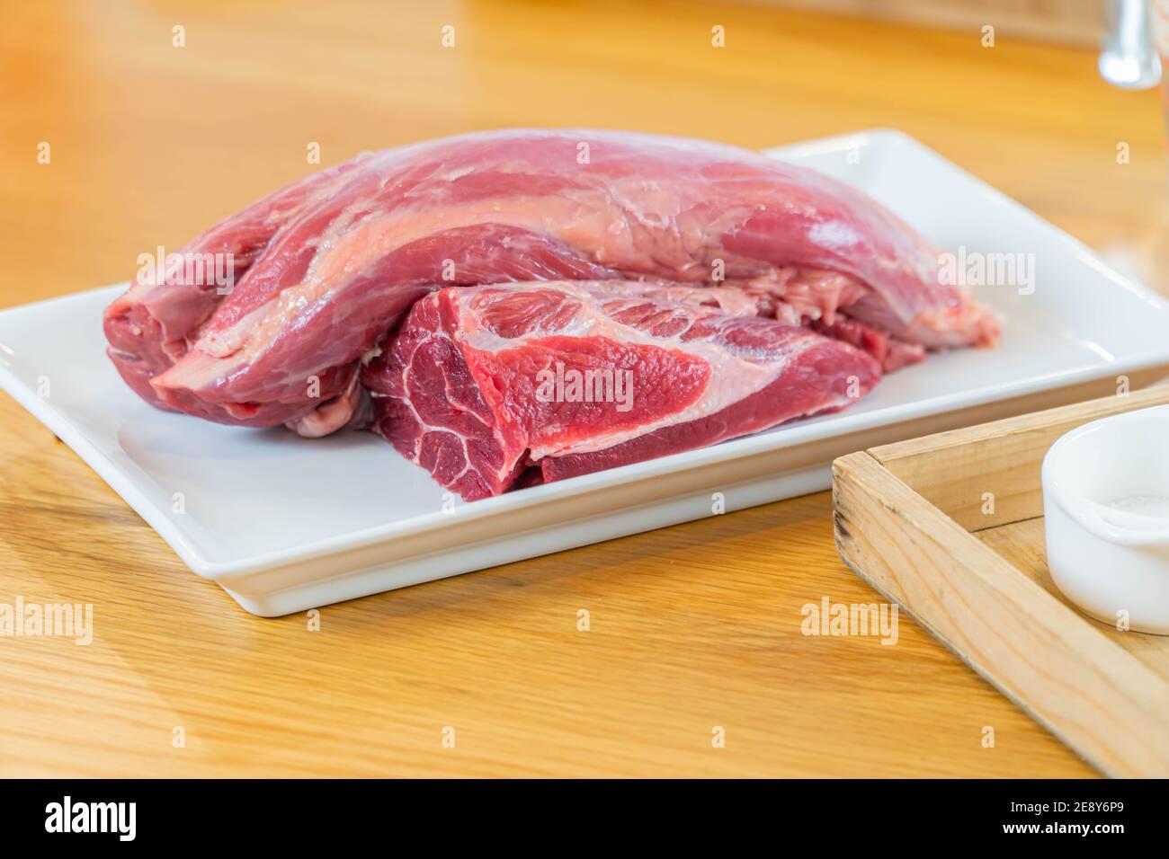 Raw pork on dish and ingredient. Stock Photo