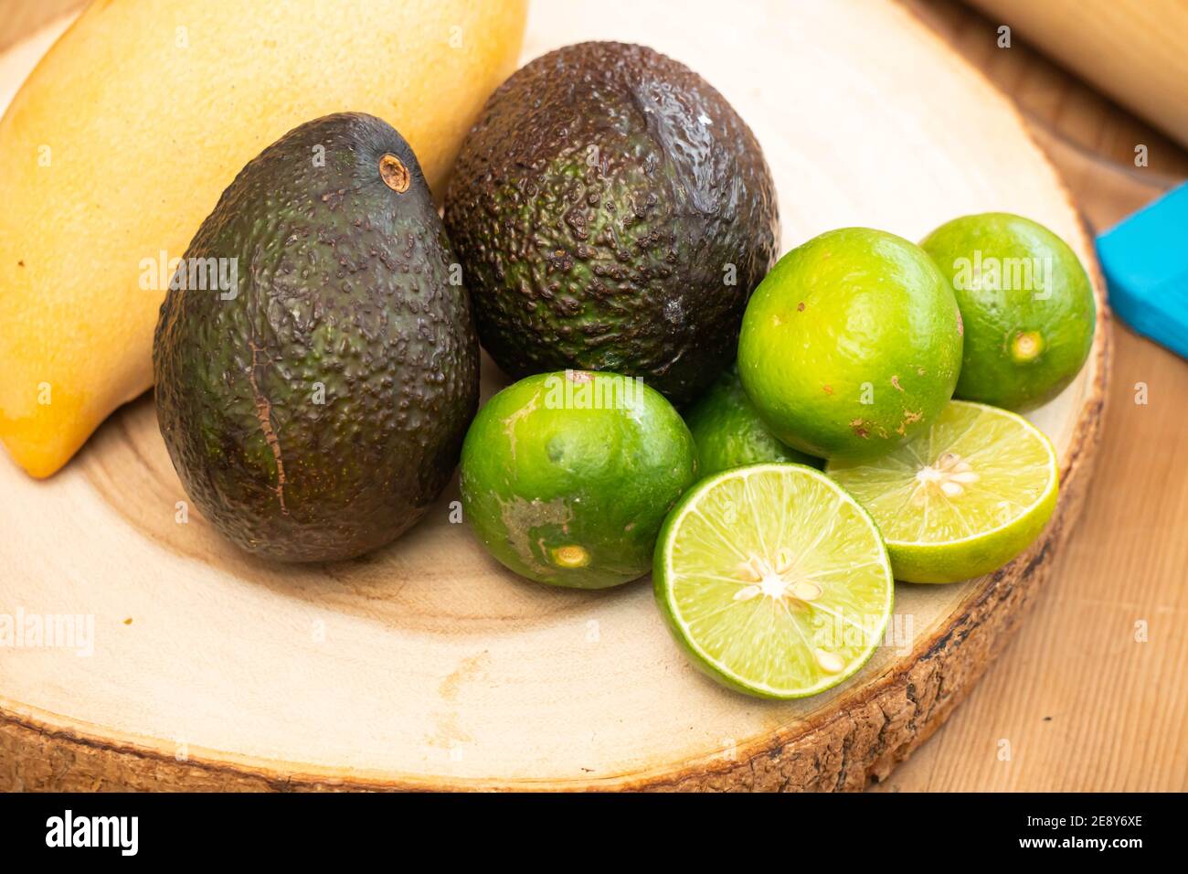 Fresh avocado tomatoes,lemon,onion, healthy food Stock Photo