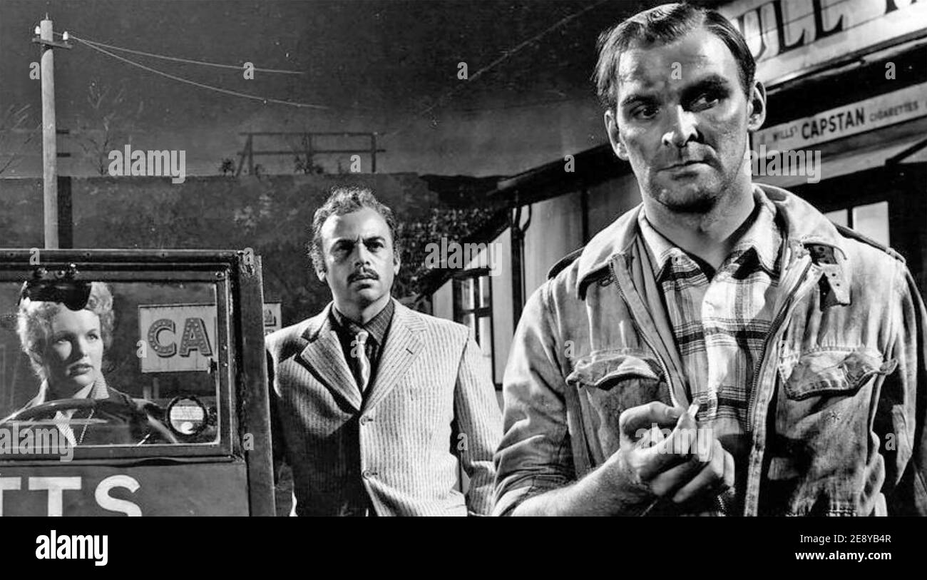 HELL DRIVERS 1957 Rank Organisation film with from left: Peggy Cummins, Herbert Lom, Stanley Baker Stock Photo