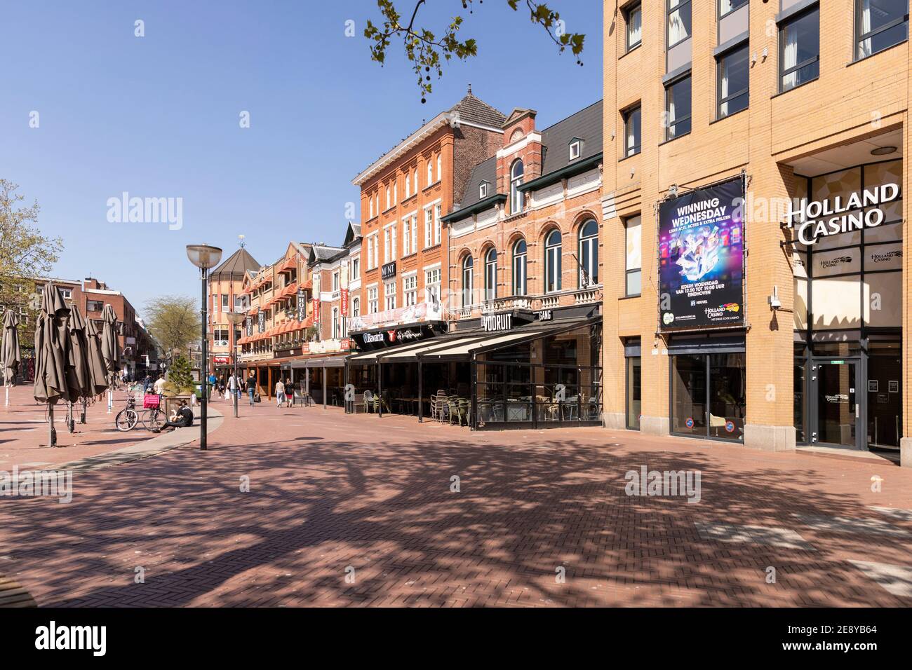 Eindhoven, The Netherlands, 21st May 2020. Eindhoven City with its empty closed centre market square on a sunny day during lockdown. Closed restaurant Stock Photo