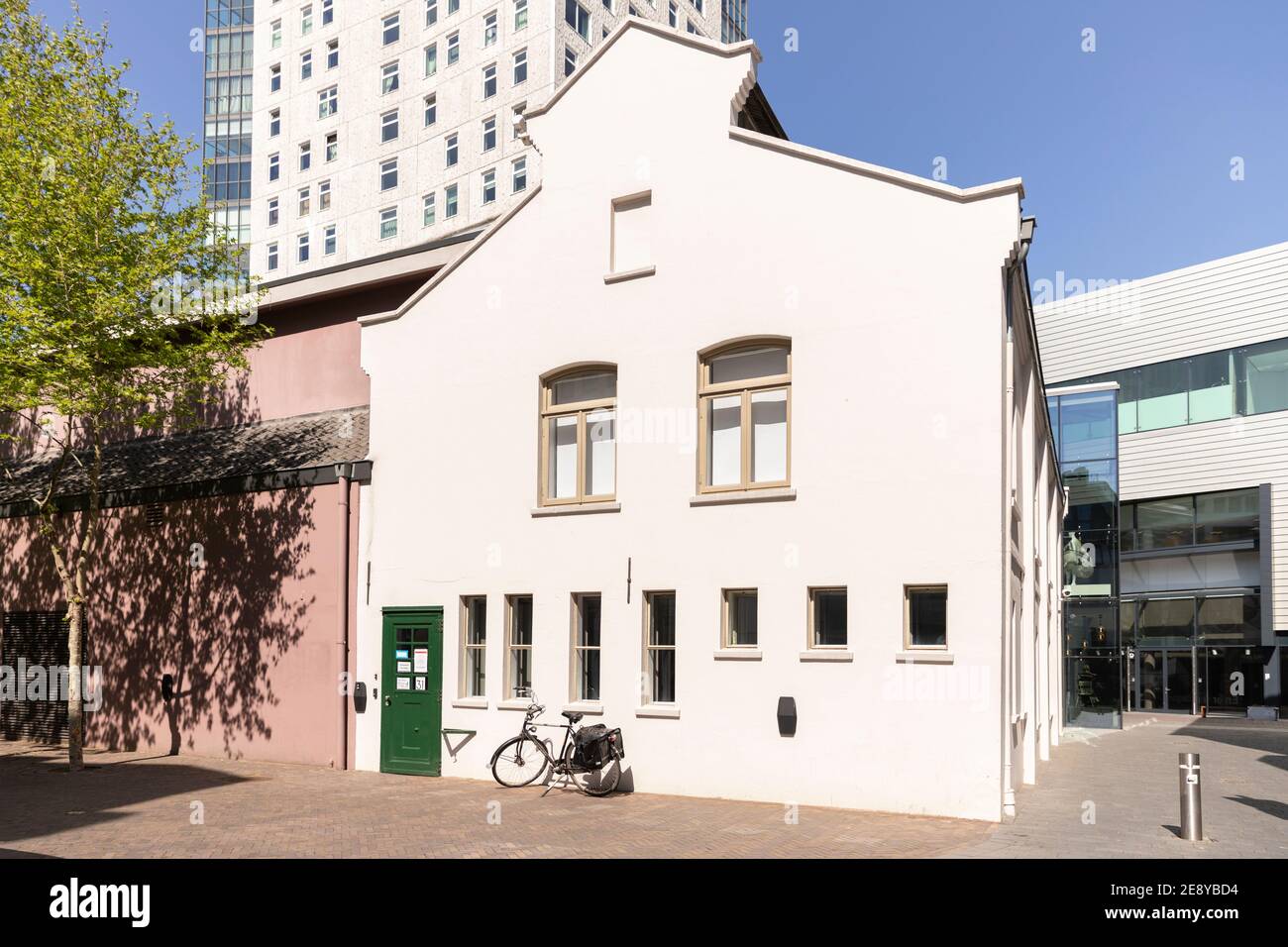 Eindhoven, The Netherlands, 21st May 2020. Eindhoven City with a white building in the city center on a sunny day an a blue sky. The Admirant and gree Stock Photo