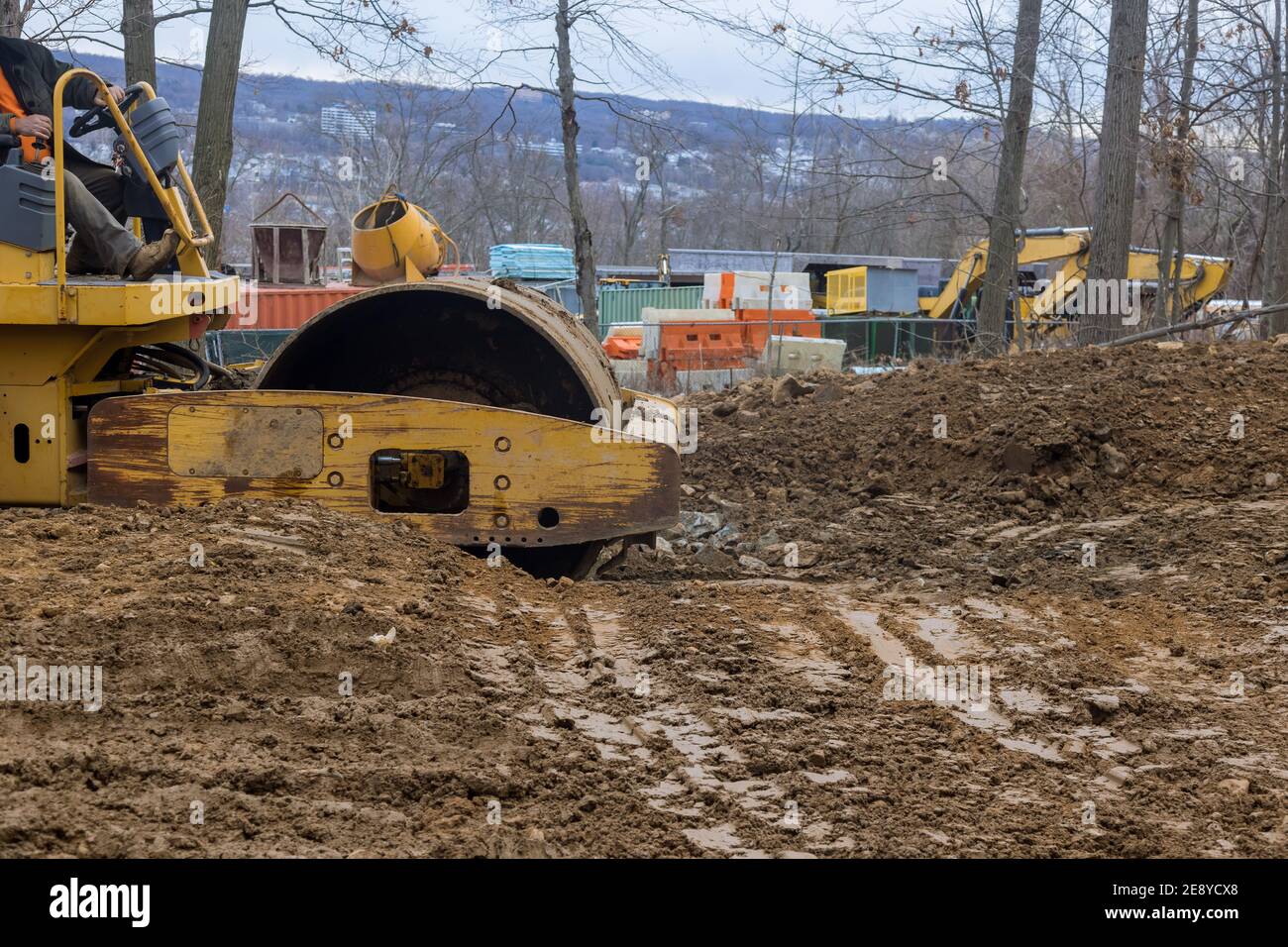 Making Roolerl Rink Working on a construction with soil skating rink road roller making new ...