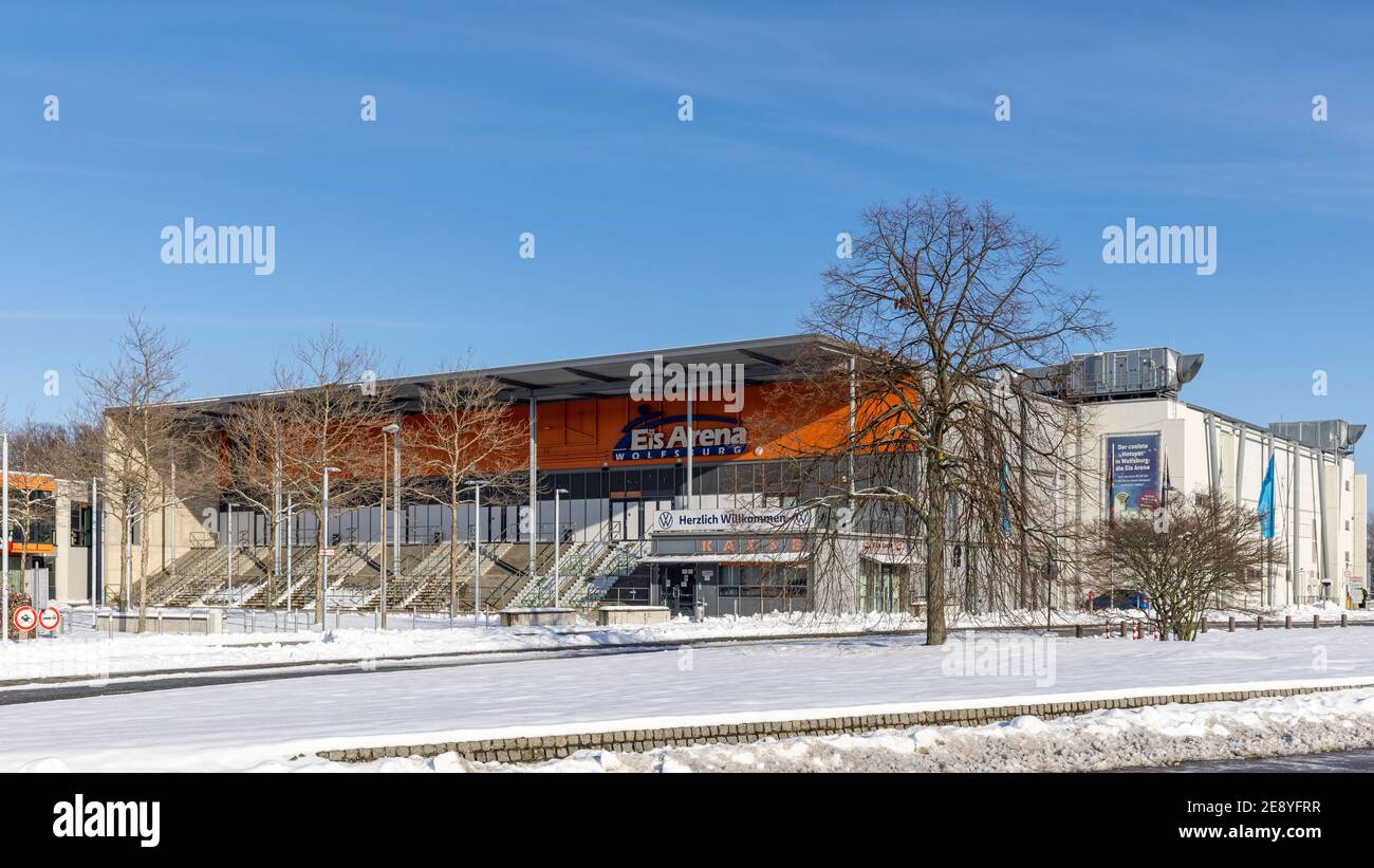 Wolfsburg Eis Arena (Ice rink) is getting ready for professional DEL game in bright winter sunlight Stock Photo
