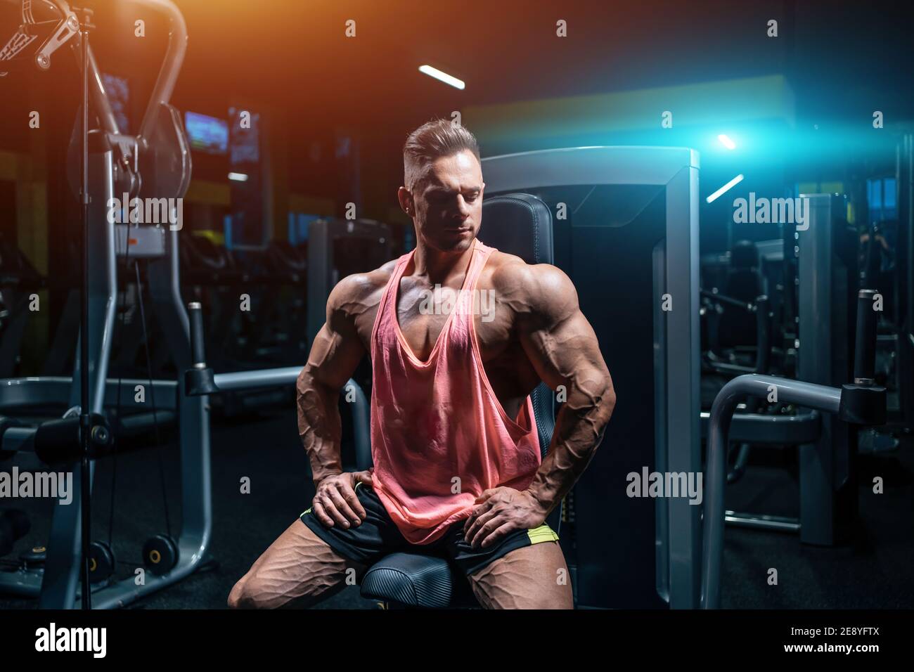 young sportsman bodybuilder with muscle body have workout in gym Stock ...