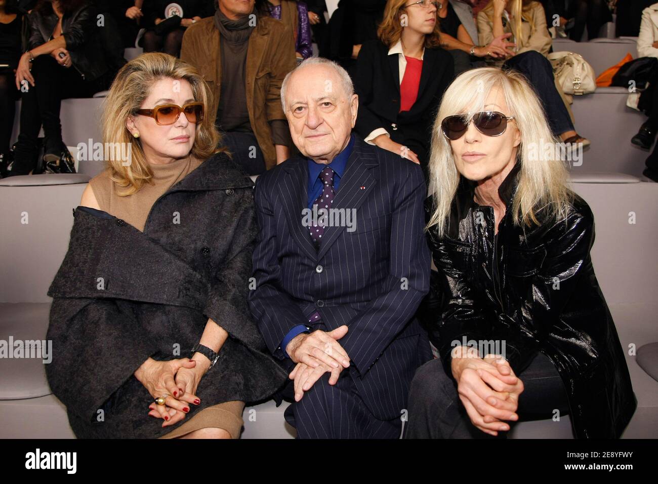 Actress Catherine Deneuve and Pierre Berge attend the Yves Saint-Laurent  Spring-Summer 2008 Ready-to-Wear collection presentation held at Le Grand  Palais in Paris, France, on October 4, 2007. Photo by  Khayat-Nebinger-Orban-Taamallah/ABACAPRESS.COM ...
