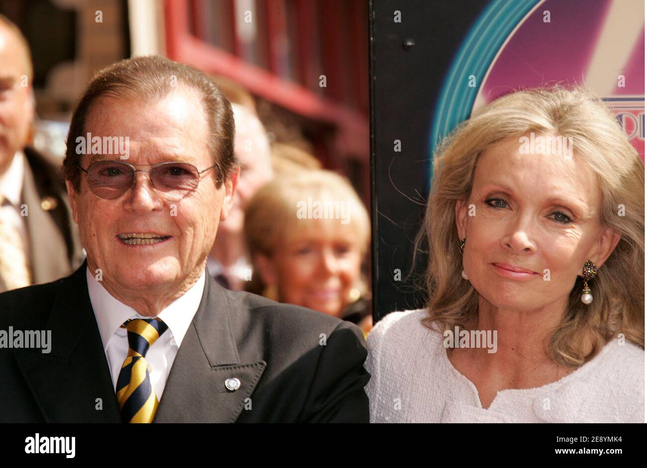 Sir Roger Moore poses with his wife Christina Tholstrup as he is honored with the 2,350th Star on The Hollywood Walk of Fame in Hollywood, CA, USA on October 11, 2007. Photo by Walker/ABACAPRESS.COM Stock Photo