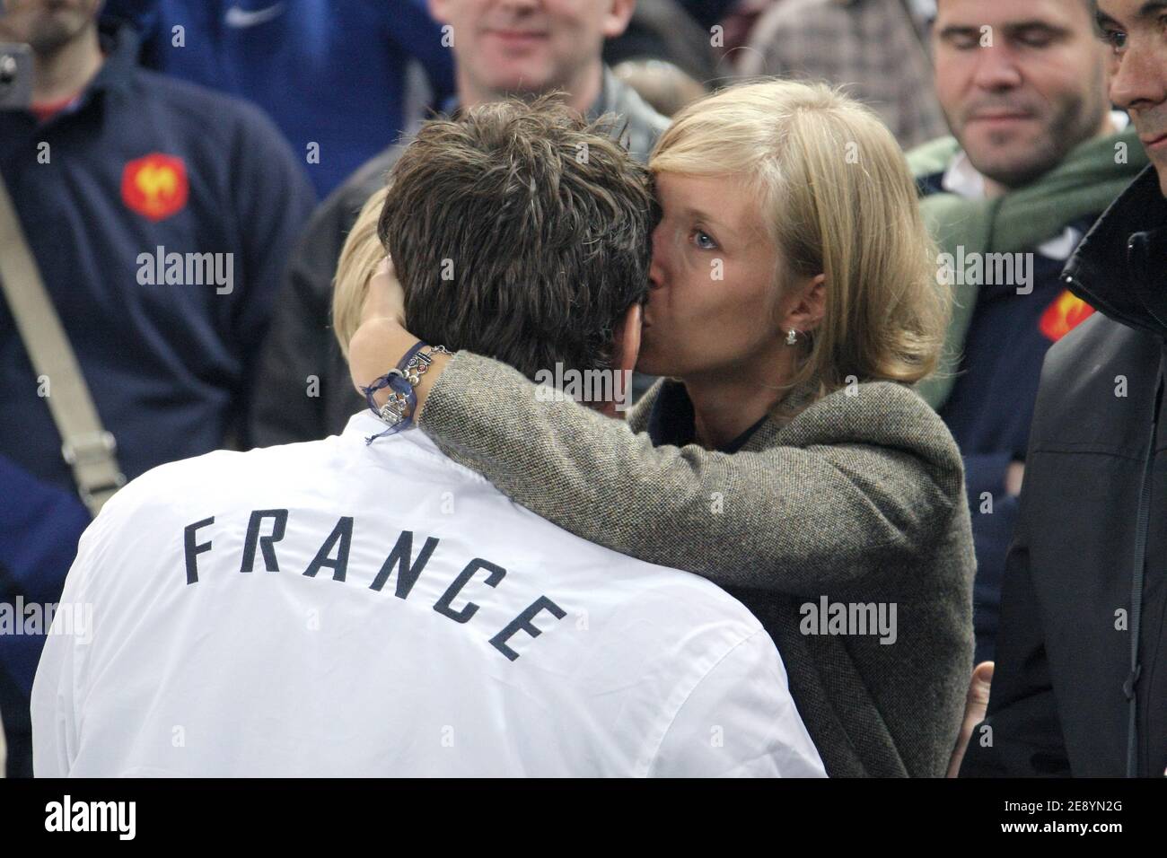 France's Fabien Pelous and his wife stand dejected after