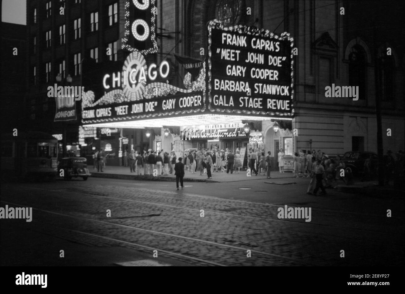Crowd and Movie Theater Marquee at Night, Chicago, Illinois, USA, John Vachon, Farm Security Administration, July 1941 Stock Photo