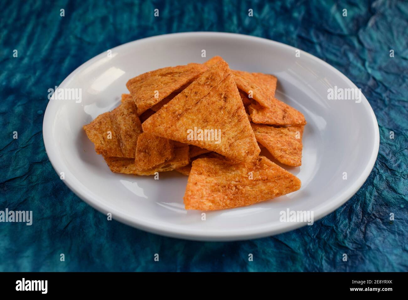 Crunchy tasty tea time snacks Nachos or Nacho chips Stock Photo Alamy