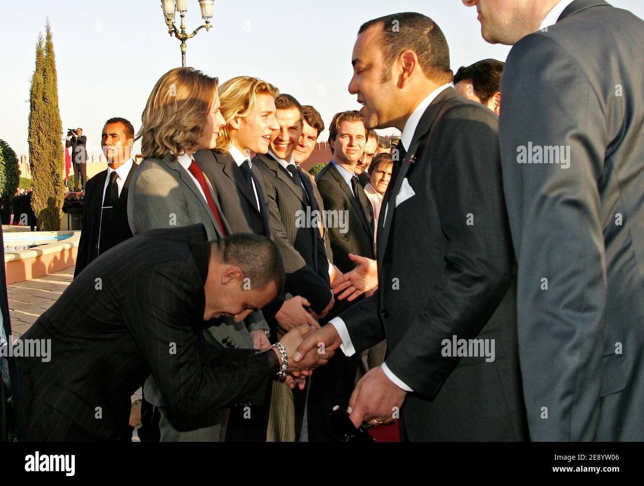 Morocco's King Mohammed VI greets Singer Faudel during a welcome ceremony at the Marrakech airport, Morocco, on October 22, 2007, on the first day of a 3-Day state visit to Morocco Kingdom. Photo by Christophe Guibbaud/ABACAPRESS.COM Stock Photo