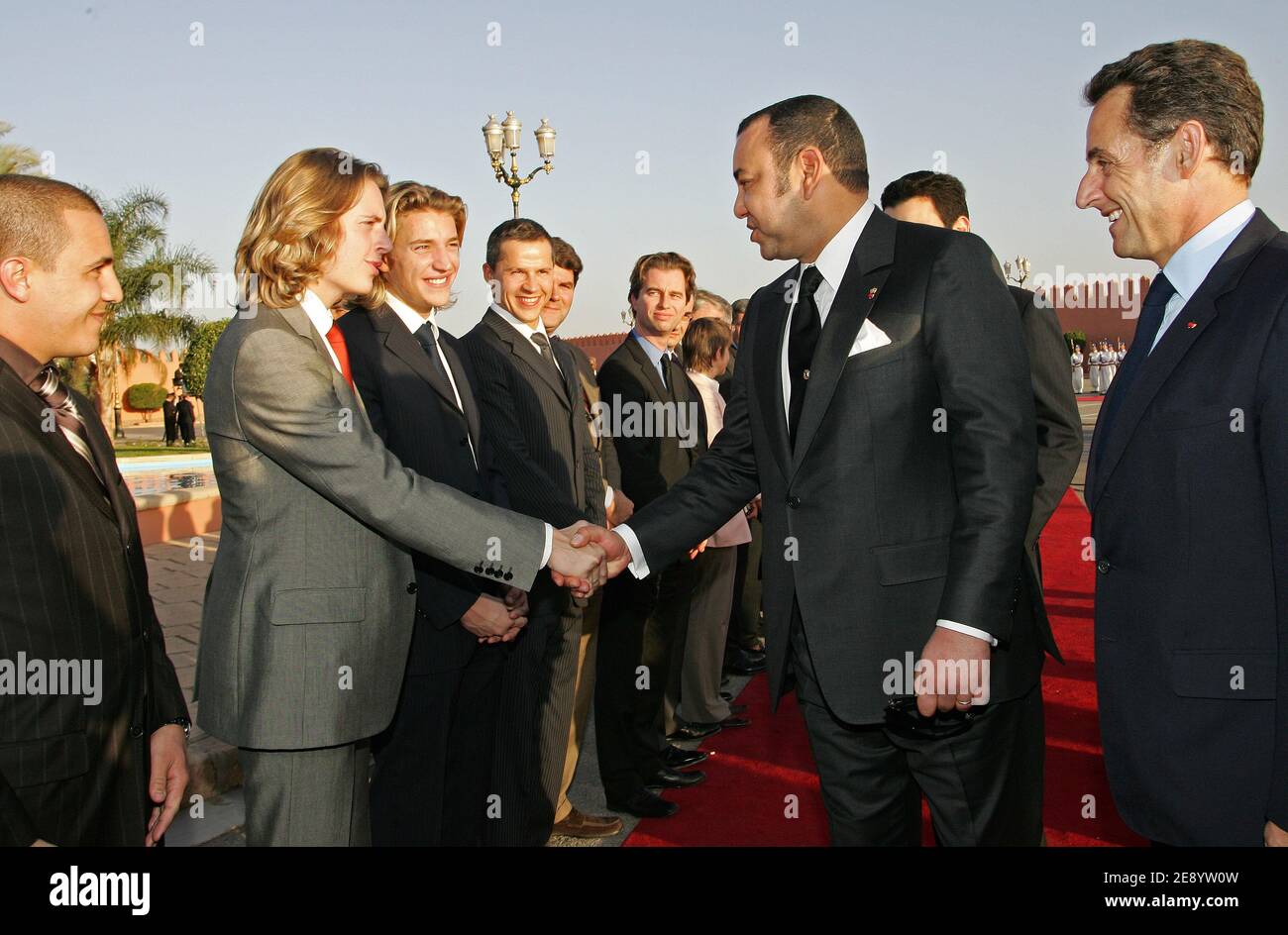 Morocco's King Mohammed VI greets French president Nicolas Sarkozy's sons Jean and Pierre next to singer Faudel and Nicolas Sarkozy during a welcome ceremony at the Marrakech airport, Morocco, on October 22, 2007, on the first day of a 3-Day state visit to Morocco Kingdom. Photo by Christophe Guibbaud/ABACAPRESS.COM Stock Photo