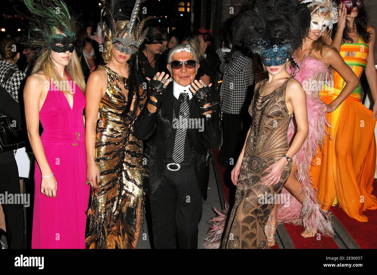 Designer Roberto Cavalli dressed as designer Karl Lagerfeld attends the ...