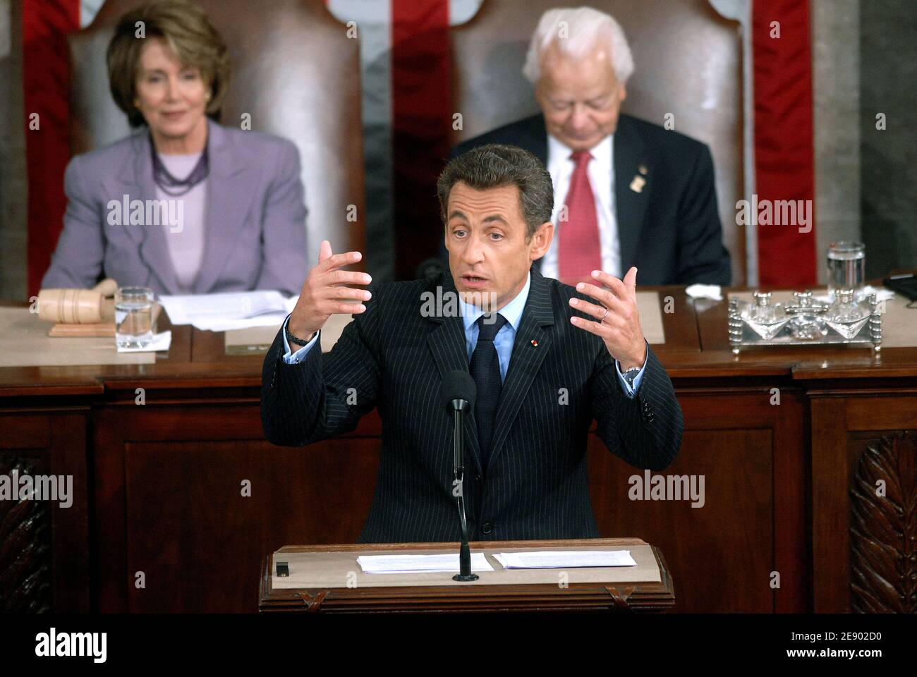 French President Nicolas Sarkozy addresses the US Congress in Washington, DC, USA, on November 2007. Sarkozy's address to Congress, the first by a French leader in eleven years, comes amid improved relations between both countries. US Speaker of the House Nancy Pelosi and Sen. Richard Byrd (D-WVA) are seen in the background. Photo by Olivier Douliery/ABACAPRESS.COM Stock Photo