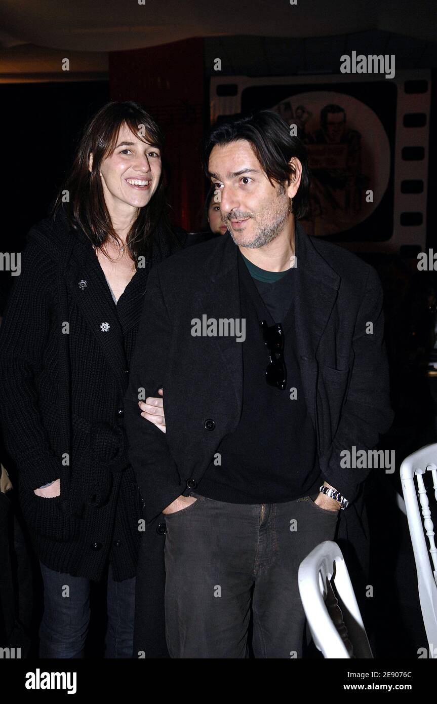 French actress Charlotte Gainsbourg and husband Yvan Attal attend the