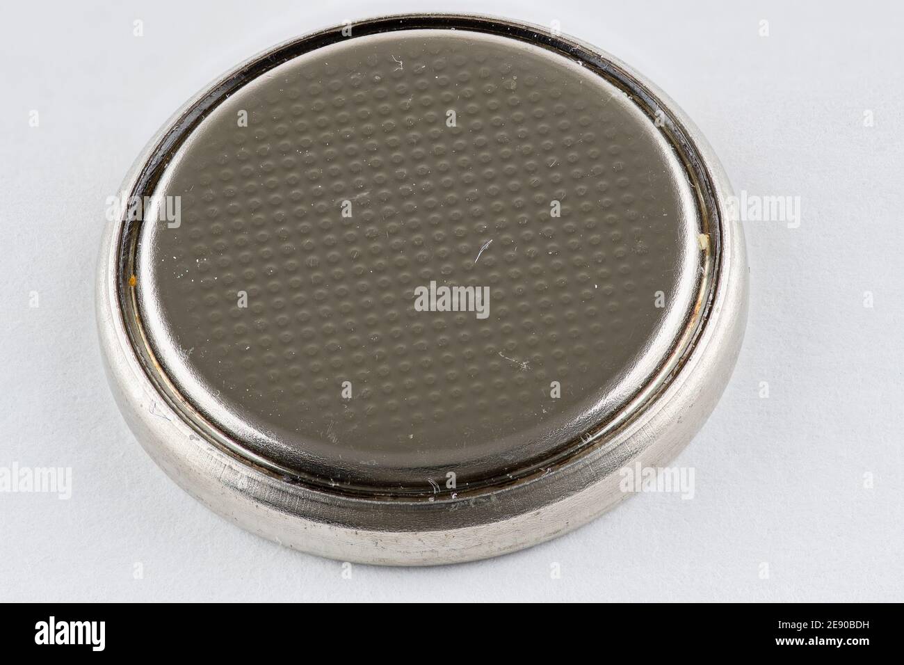 A CR2032 button cell lithium battery isolated Stock Photo Alamy