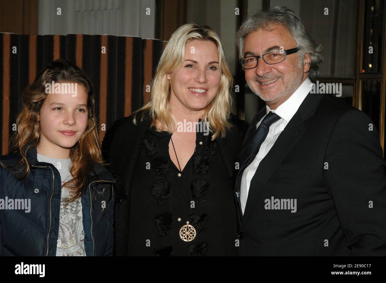 Hairdresser Franck Provost, Sophie Favier and her daughter Carla-Marie attend the unveiling of the 2008 UNICEF Calendar, held at the Baccarat headquarters in Paris, France, on November 28, 2007. Photo by Nicolas Khayat/ABACAPRESS.COM Stock Photo