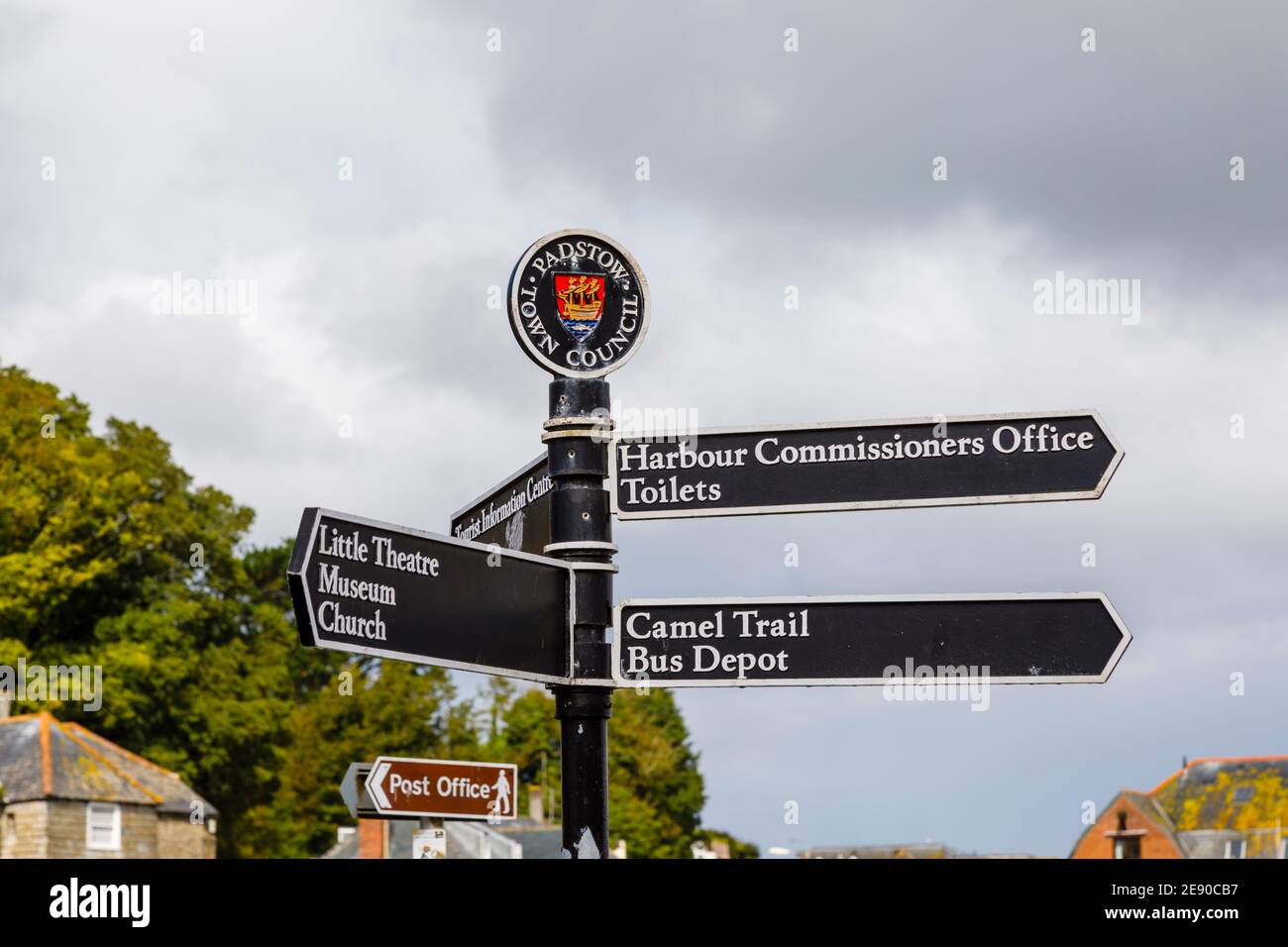 A signpost with directions to local amenities, Padstow, a small town/fishing village on the west bank of the River Camel estuary, north coast Cornwall Stock Photo